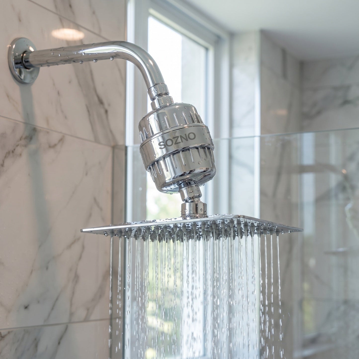 Sozno chrome shower filter installed on a shower arm, water flowing